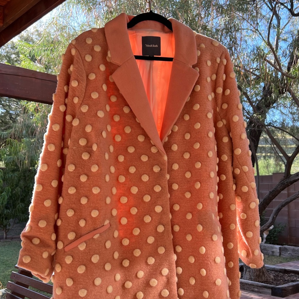 ModCloth Pink wool coat with white polka dots. It’s fun and warm!